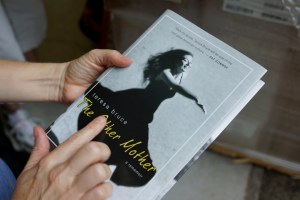 She's perfect! (of course, the baby's a she) All embossed letters intact and touchable :)